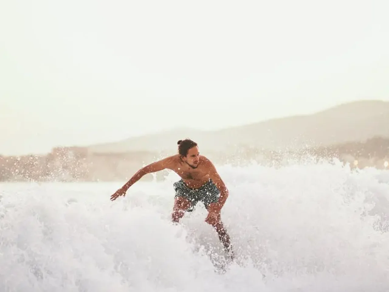 man-on-a-skimboard-catching-a-wave-in-a-beach-in-p-2023-11-27-05-25-18-utc-min